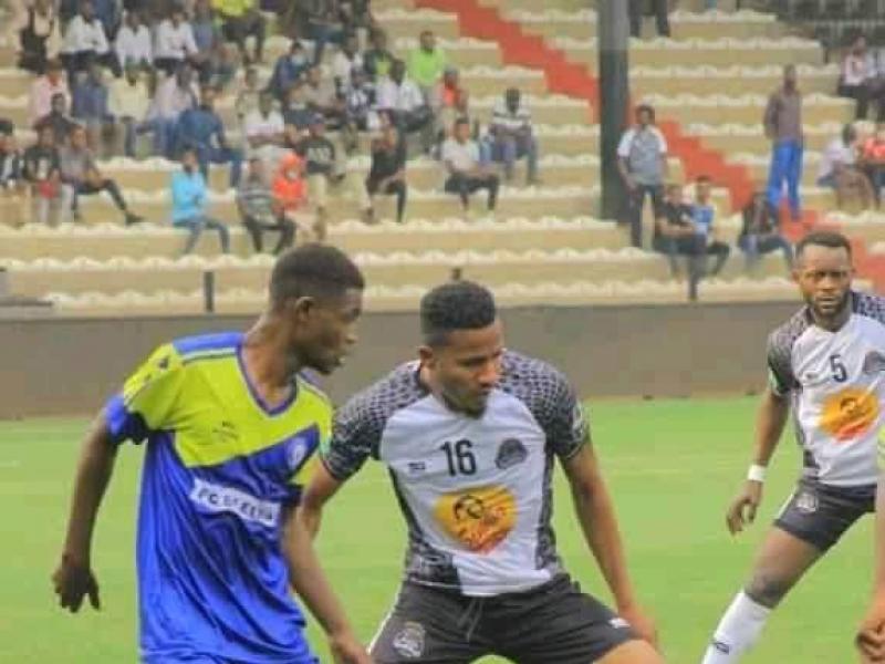 Les joueurs du TP Mazembe en duel avec ceux du FC Blessing de Kolwezi.