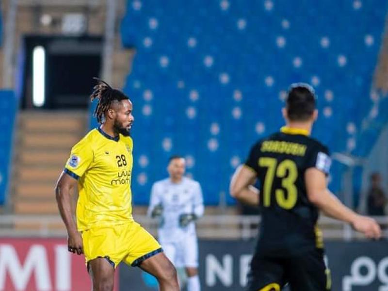 Christian Luyindama sous les couleurs d'Al Taawoun, en Ligue des Champions Asiatique.