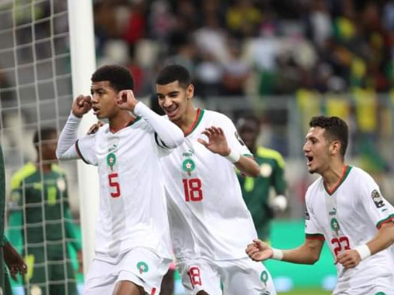 Les Lionceaux de l'Atlas du Maroc en pleine célébration d'un but.