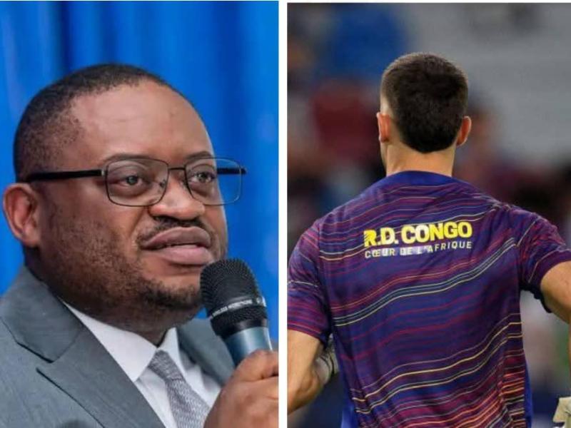 Le ministre Doudou Fwamba, et un joueur du FC Barcelone [ vu de dos ]