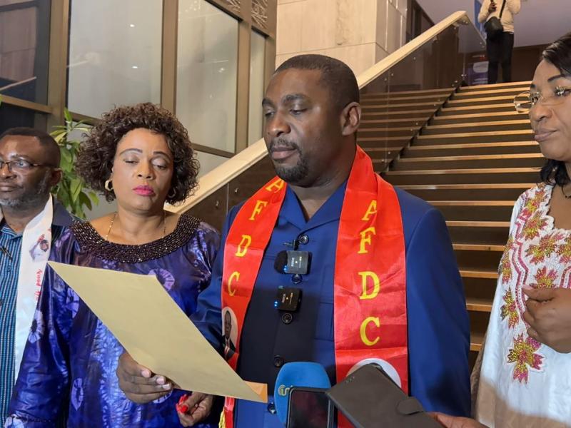 Le député national Patrick Munyomo, entouré de ses collègues membres du groupe parlementaire AFDC-A