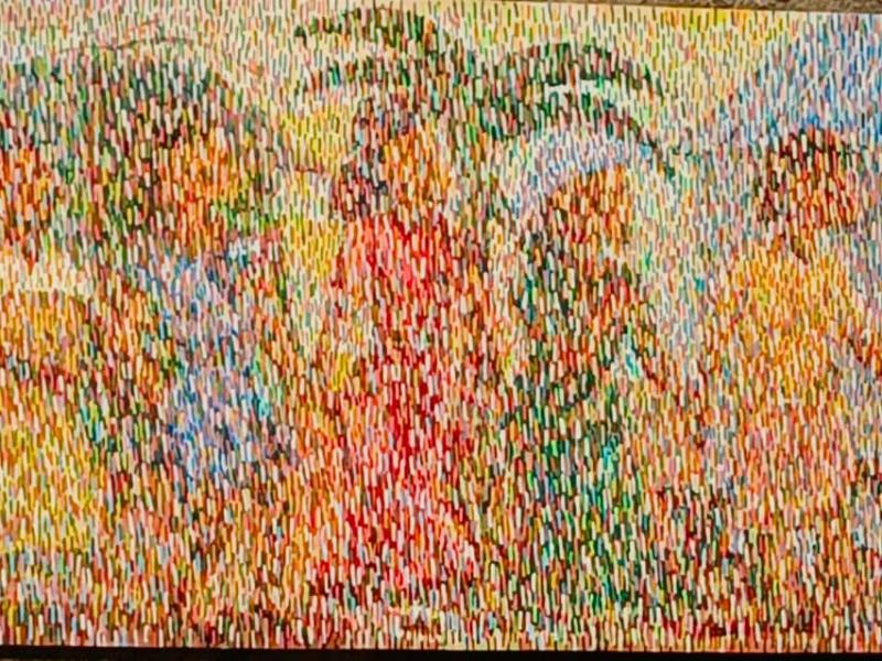Une œuvre de l’artiste visuel congolais Baba Tshikama, dont la peinture se distingue par ses traits verticaux et ses couleurs vives.