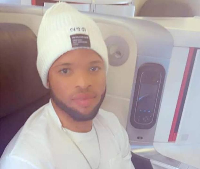 Meschack Elia à bord d'un avion en direction pour Kinshasa.
