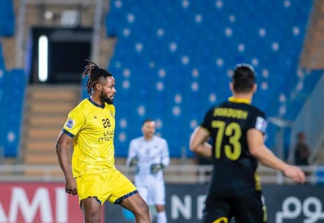 Christian Luyindama sous les couleurs d'Al Taawoun, en Ligue des Champions Asiatique.