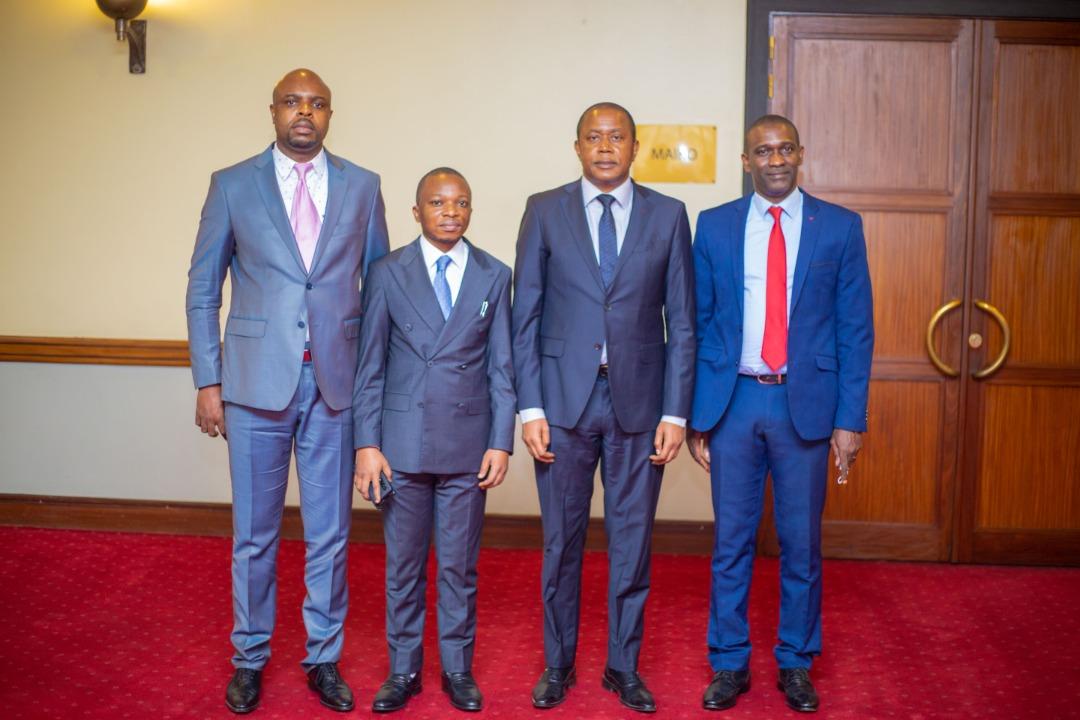 De gauche à droite, Toto Mabiku ( SEN), M. Paul Mulemberi ( Rapporteur adjoint de la CENI), M.Denis Kadima ( président de la CENI), M. Mountanga Sylva ( directeur pays IFES)
