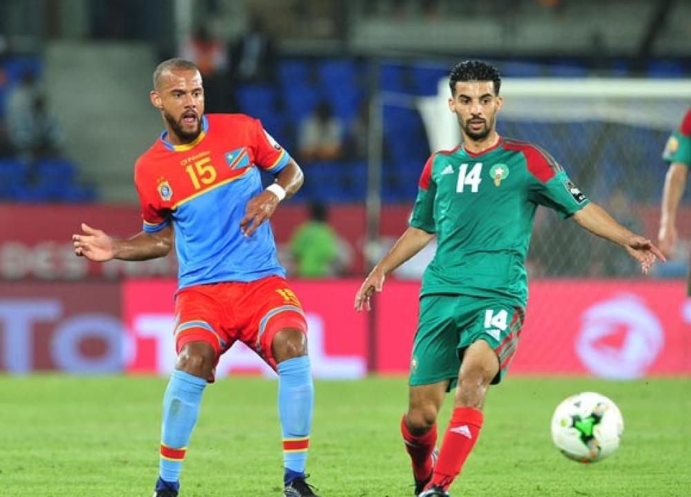 Match retour à Kinshasa des éliminatoires Mondial 2018. Rémi Mulumba en duel avec un défenseur Marocain