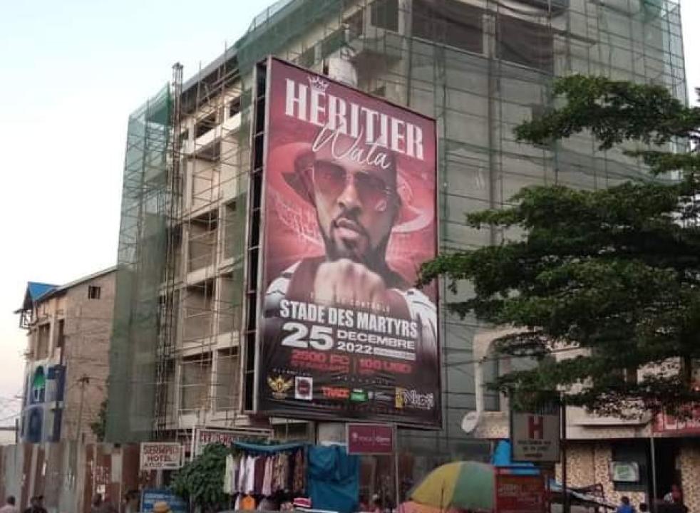Un panneau du concert de Héritier Wata, au stade des martyrs.