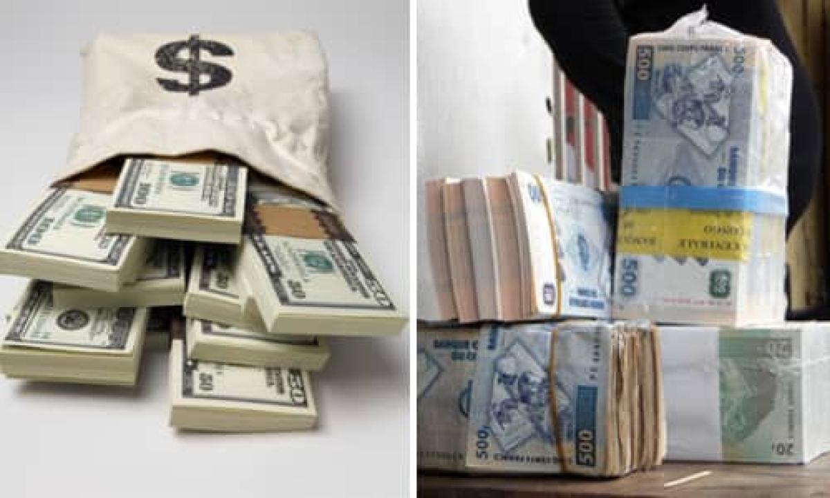 Des liasses de dollars américains et du franc congolais