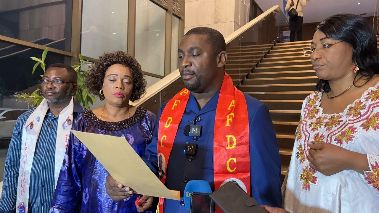 Le député national Patrick Munyomo, entouré de ses collègues membres du groupe parlementaire AFDC-A