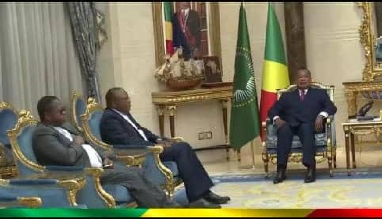 Échange entre le chef de l'État de la République du Congo, Denis Sassou Nguesso, et le Cardinal Ambo, accompagné de Mgr Nsole