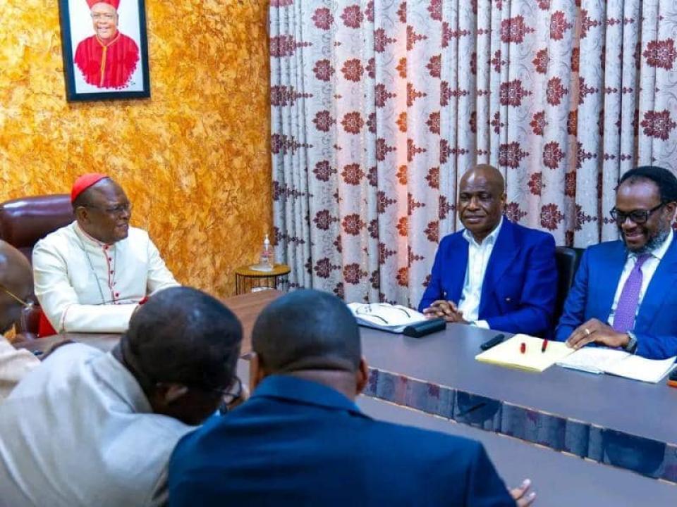 Le Cardinal Fridolin Ambongo, représentant la CENCO,  en séance de travail avec les leaders de la C64